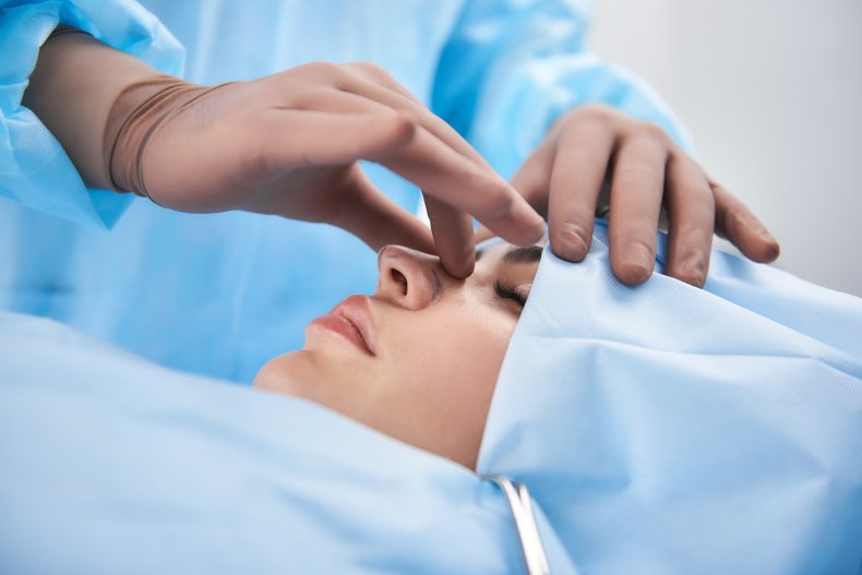 What qualifications should I look for in a rhinoplasty surgeon?